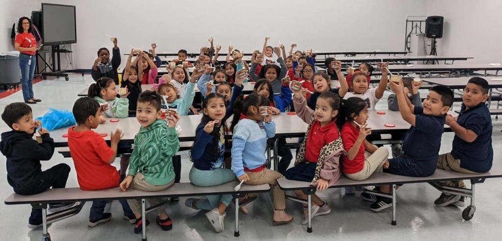 Students in Ms. Quinteros kindergarden class, being happy for having ice cream, for a perfect attendance at school