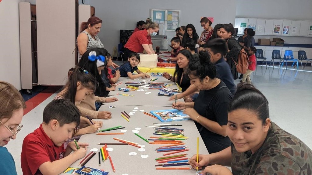 Parents and Students coloring together